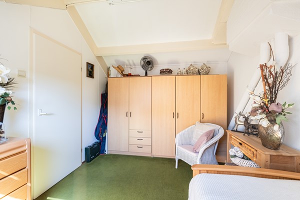 Foto - Te koop: Goed onderhouden tussenwoning in rustige woonwijk!